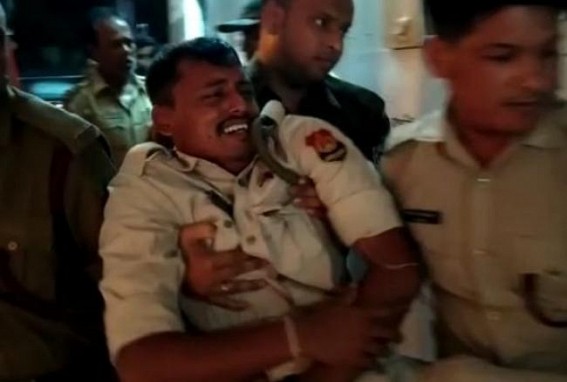 Two on-duty Police officials were injured after a Maruti Vehicle hit them in Bishalgarh Two on-duty Police officials were injured after a Maruti Vehicle hit them in Bishalgarh